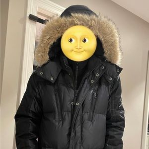 Man warm jacket with coyote fur